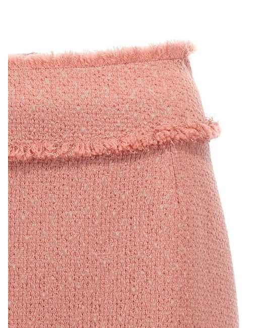 スカート DOLCE & GABBANA Tweed mini skirt Pink نيت-أ-بورتر | DOLCE&GABBANA | Frayed wool-blend tweed mini skirt