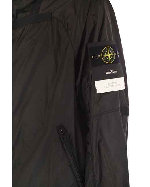 Stone Island Black Lightweight Hooded Jacket With Anti-Drip And Reflective Details for men