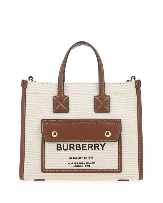 Burberry Natural Handbags.