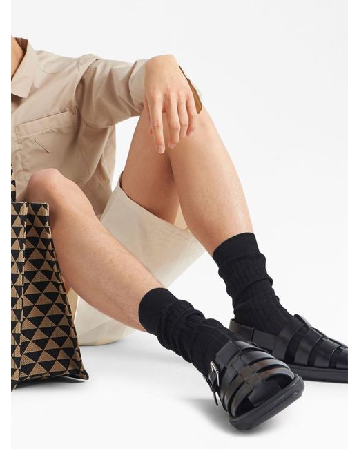 Prada Black Interwoven Straps Flat Sandals for men