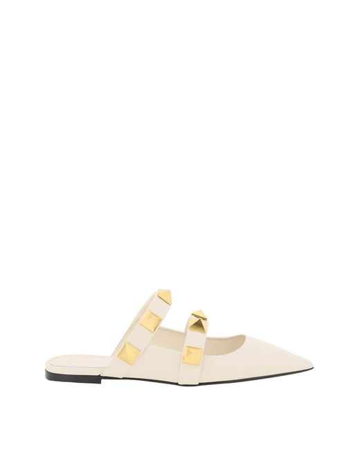 roman stud flat mule