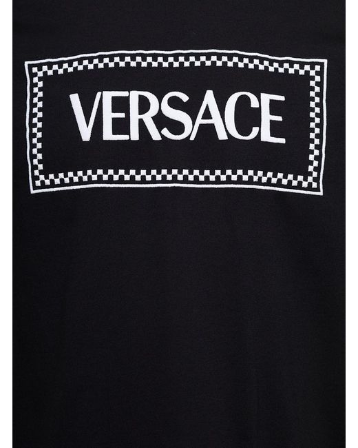 Versace Black Crewneck T-shirt With Contrasting Logo Lettering Print In Cotton Man for men