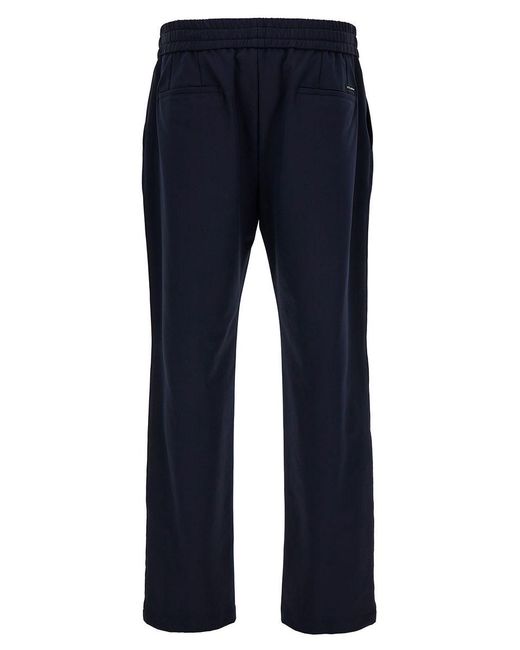 Dolce & Gabbana Blue Joggers Pants With Drawstring And Logo Patch for men