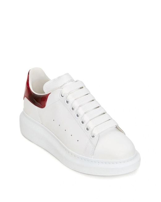 Red and white on sale alexander mcqueen sneakers