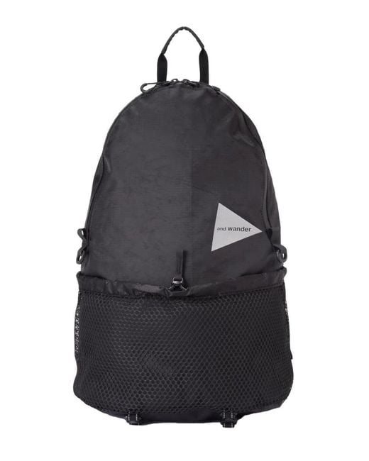 And Wander Blue Backpacks for men