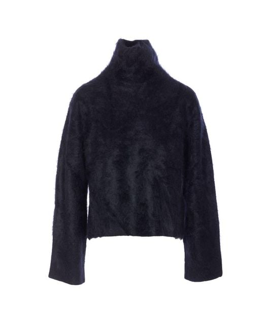 Lisa Yang Blue Sweaters