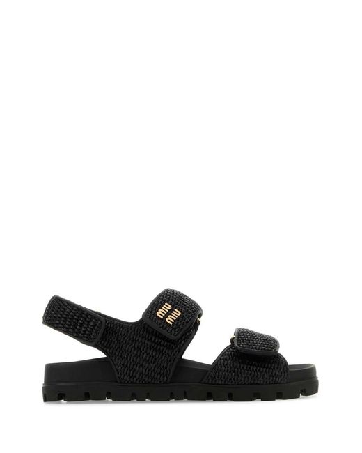 サンダル・ミュール MIU MIU Women Sandals 5Y410E F005070F0002 Black Miu Miu Sandals in Black | Lyst