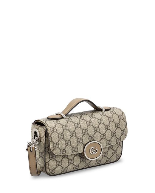 Gucci Metallic Handbags