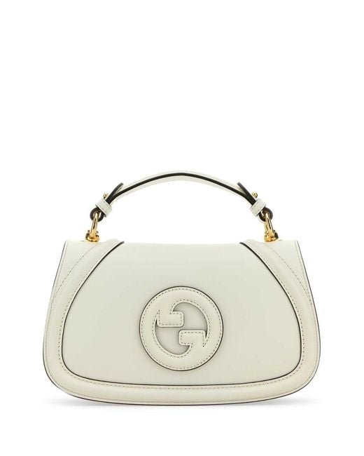 Gucci Metallic Handbags