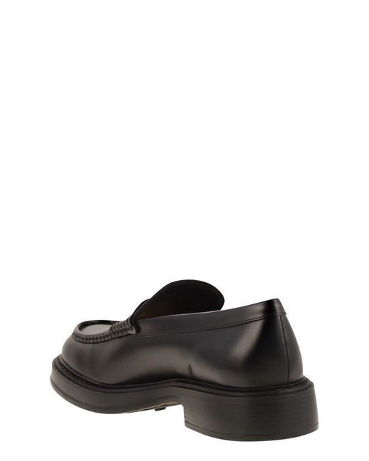 Tod's Black Leather Loafers for men