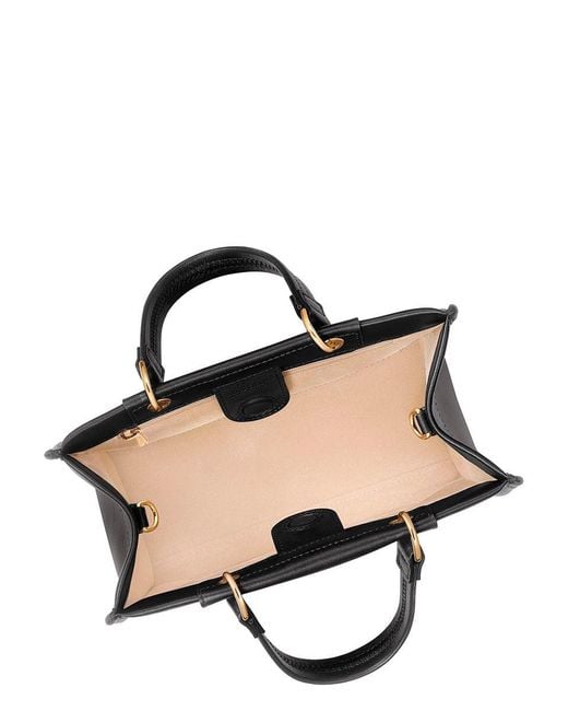 Longchamp Black Handbag With Embossed Logo On The Front And Adjustable And Removable Shoulder Strap