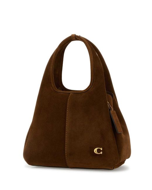 COACH Brown Handbags.