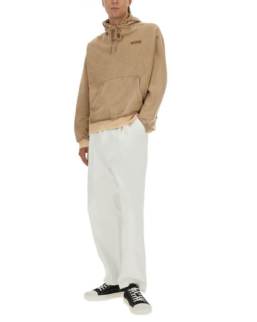 Moschino Natural Washed Hoodie With Logo And Studded Design for men