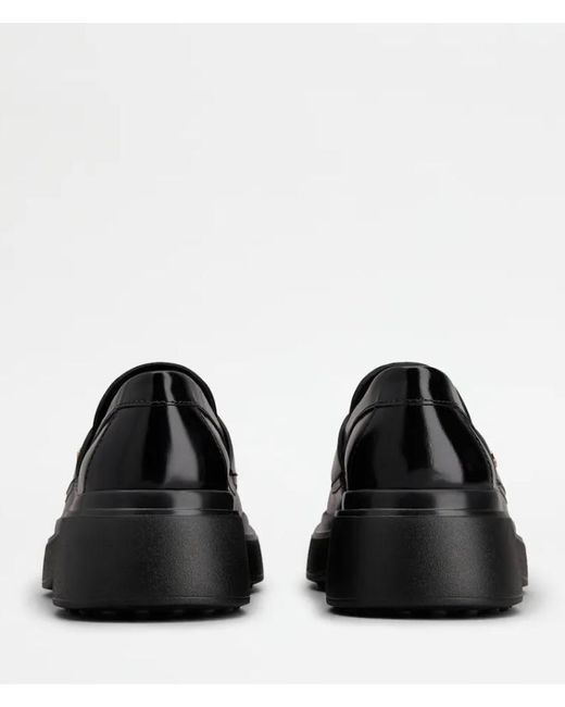 Tod's Black Flat Shoes