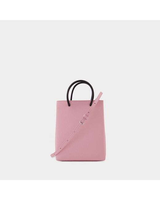 Balenciaga Phone Holder in Pink | Lyst