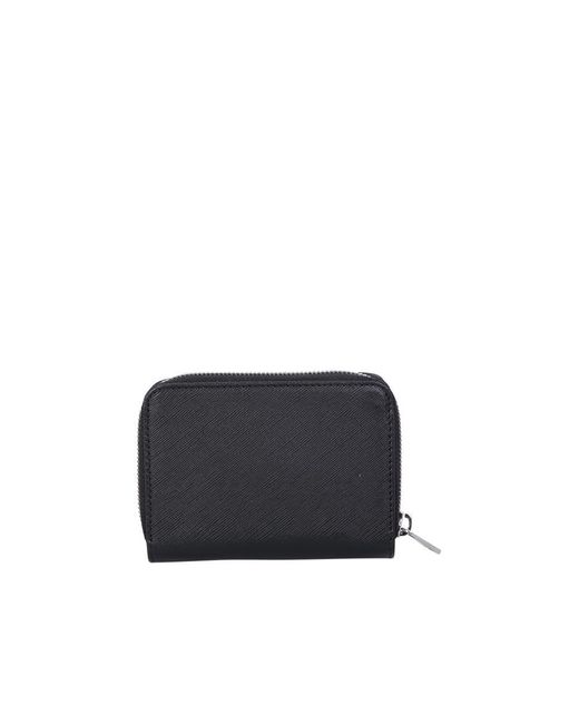 A.P.C. Black The Zipped Wallet From Features An Embossed Texture And An Embossed Logo for men