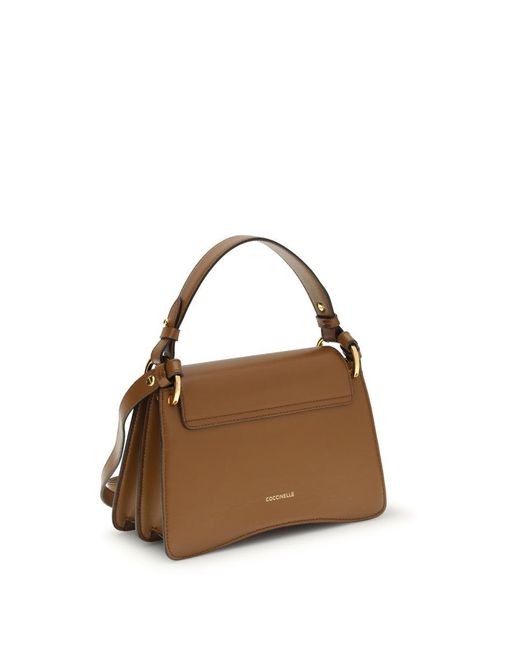 Coccinelle Natural Handbags