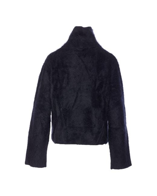 Lisa Yang Blue Sweaters