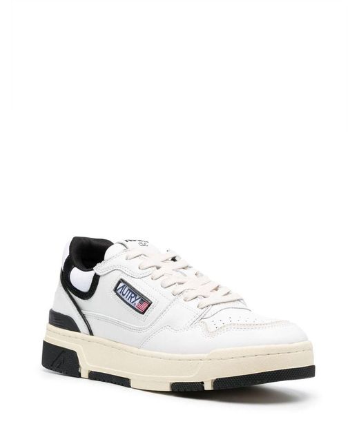 Autry Clc Sneakers In White And Leather for men