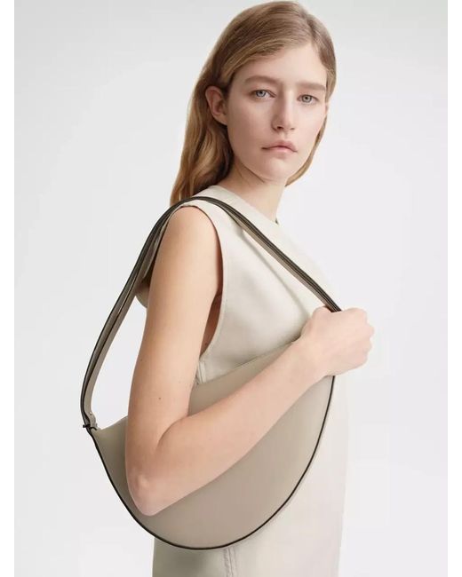 Totême  Metallic Scooped Sling Shoulder Bag