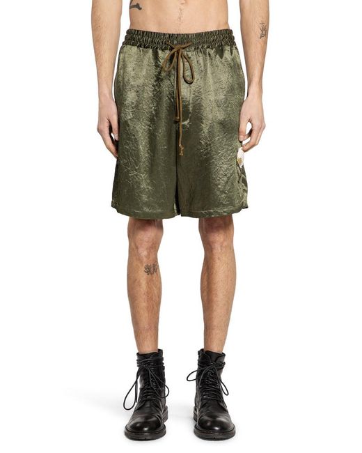 Song For The Mute Green Shorts & Skirts for men