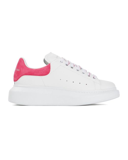 Alexander mcqueen pink hotsell and white sneakers