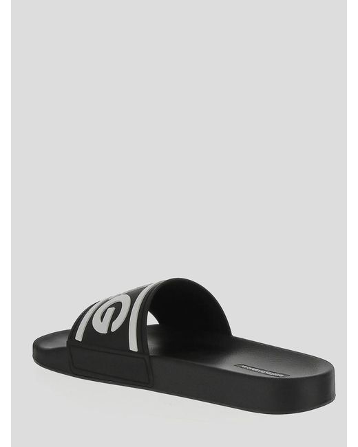 Dolce & Gabbana Black Technical Logo Embossed Slides for men