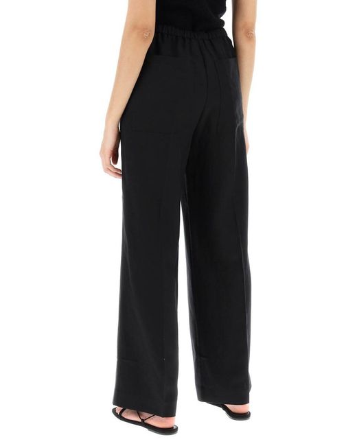 Totême  Black Toteme Lightweight Linen And Viscose Trousers