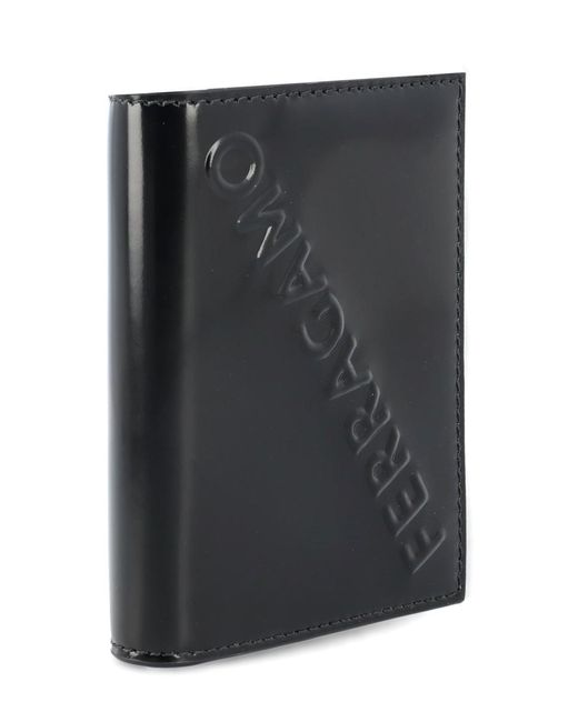 Ferragamo Black Logo Embossed Bi-fold Wallet for men