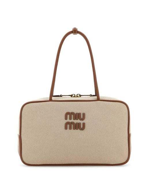 Miu Miu Natural Handbags