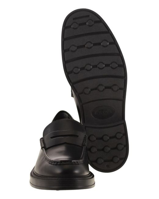 Tod's Black Leather Loafers for men