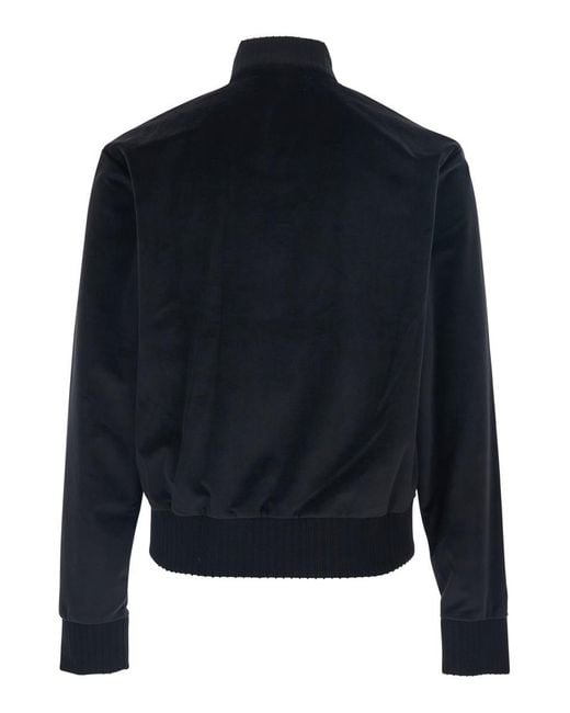 Amiri Blue Jacket With High Neck And Logo Embroidery On The Front for men