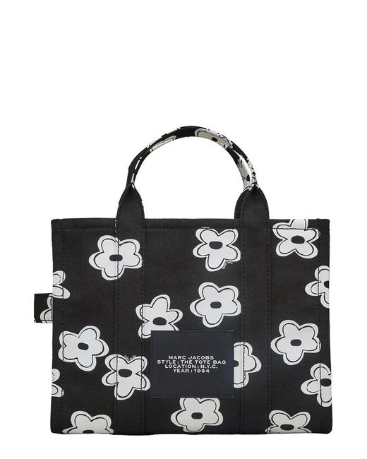 Marc Jacobs Black 'The Medium Tote' Handbag With Logo Lettering On The Front And All-Over Floral Print