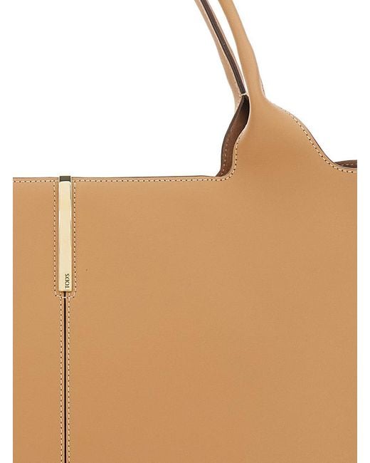 Tod's Brown Tote Bag With Two Top Handles And Logo Plaque On The Front
