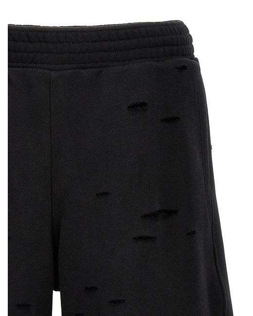 Givenchy Black Detroyed-effect Bermuda Shorts for men