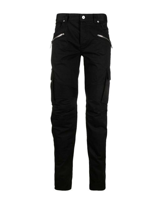 Balmain Black Coated Biker Jeans, $1,400 | SSENSE | Lookastic