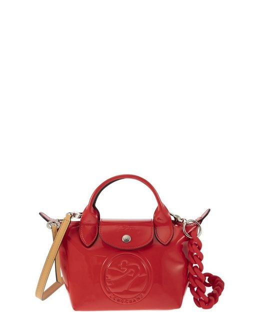 Longchamp Leather Le Pliage Cuir Xs Gloss Handbag in Red Lyst
