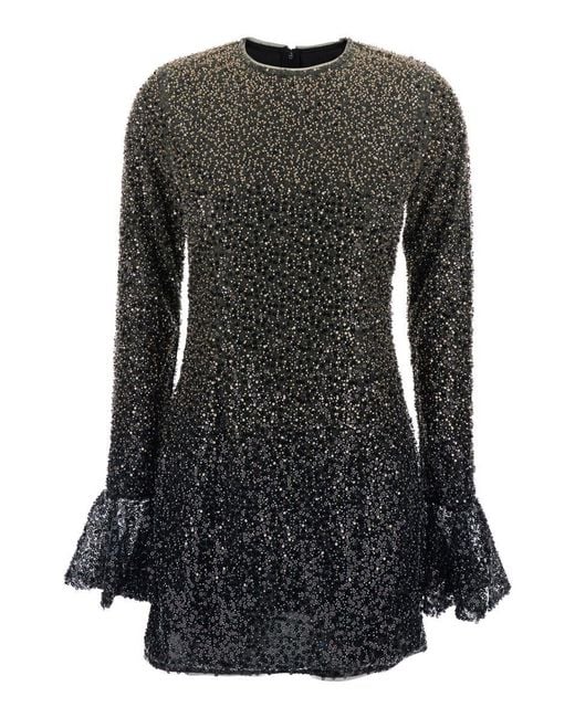 black rotate dress Rotate black mini dress with back detail  Marjon Snieders