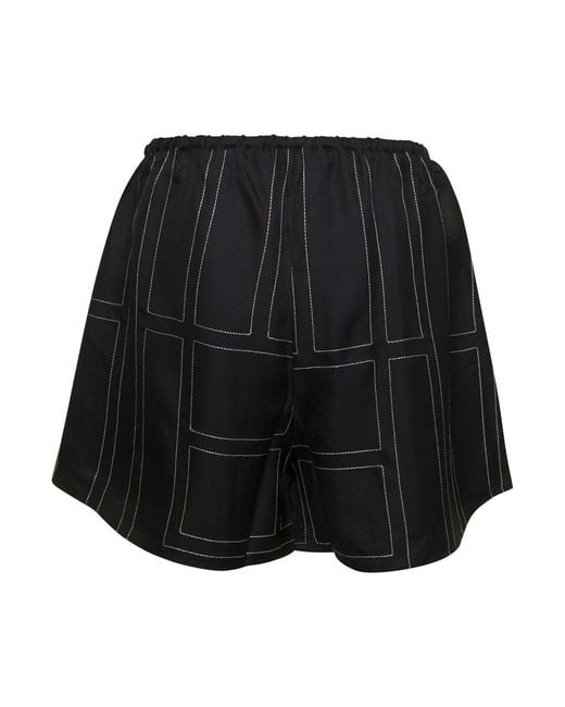 Totême  Black Shorts With Geometric Logo Print
