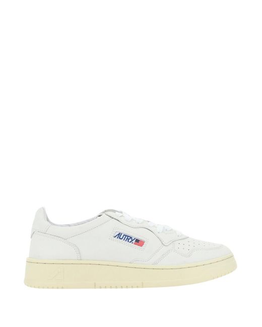 in style white sneakers
