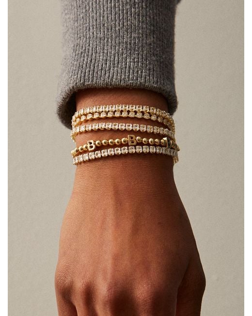 BaubleBar Metallic Gold Repeating Initial Pisa Bracelet