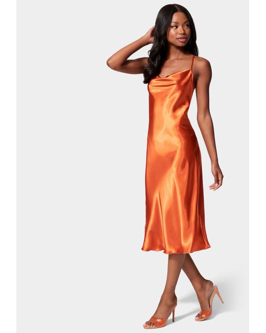Bebe Satin Cowl Neck Slip Midi Dress in Orange | Lyst Australia