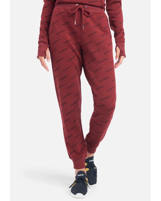 Bebe Sport All Over Printed Fleece Jogger Pant In Red Lyst
