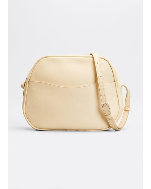 The Row Eve Zip Crossbody Bag In Calf Leather in Natural Lyst