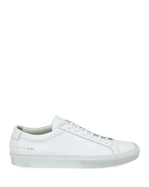 white sneakers common projects
