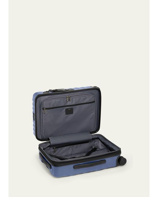 Tumi Blue International Expandable 4-wheel Carry On Luggage