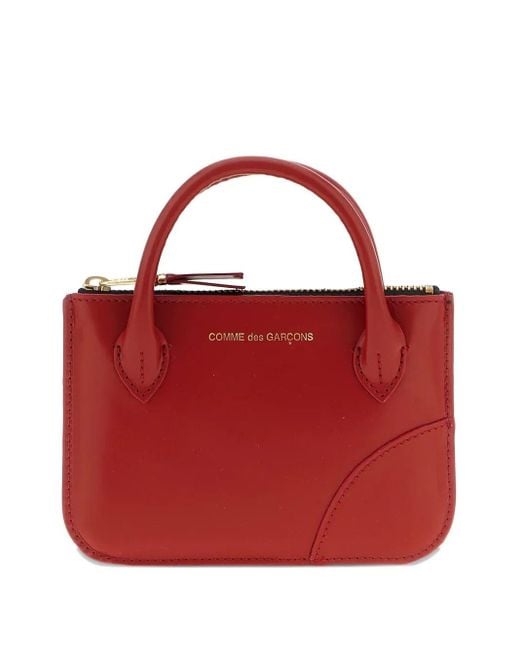Comme des Garçons Red Handles