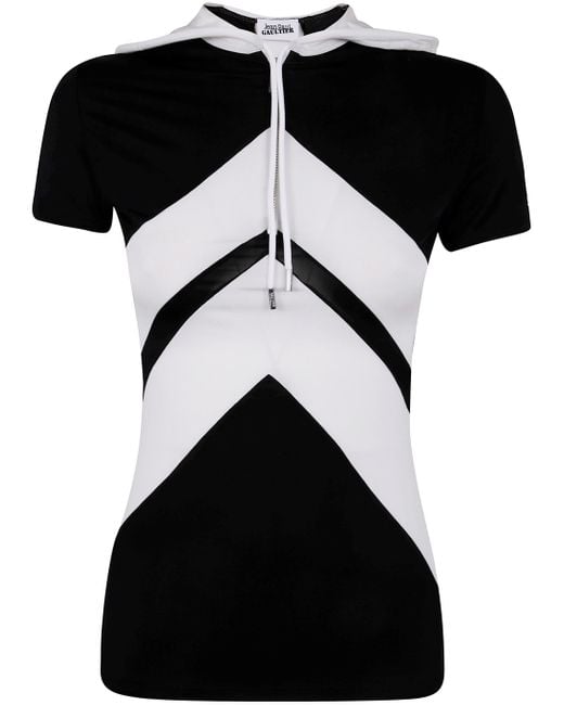 Jean Paul Gaultier Black Viscose Baby Tee Shirt With Inlaid Chevron, "Gaultier" Patch Detail And Hood Clothing
