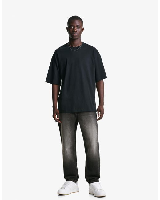 Bershka Black Loose Tapered Jeans for men