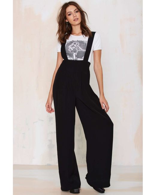 Black pants with suspender straps by Marc Jacobs  Suspenders for women Suspender  pants Fashion